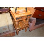 A pair of Continental hardwood square topped table