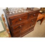 A stained pine chest fitted two short over three l