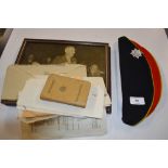 An Army Officer's dress hat together with photos a