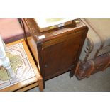 An oak bedside cupboard