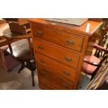 An Edwardian satin wood chest fitted five drawers