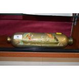 A Victorian glass rolling pin depicting figures in