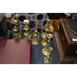 A quantity of various 19th Century brass candlesti
