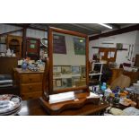 A Victorian mahogany swing framed mirror