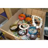 A tray of costume jewellery and bangles