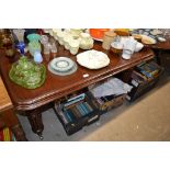 A Victorian style mahogany extending dining table