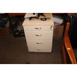 A four drawer filing chest