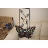 Three decorative metal wall hangings