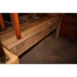 An oak effect oblong bench