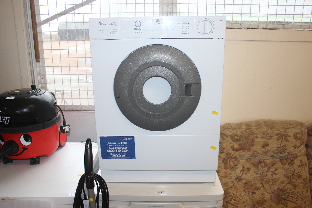 An Indesit tumble dryer