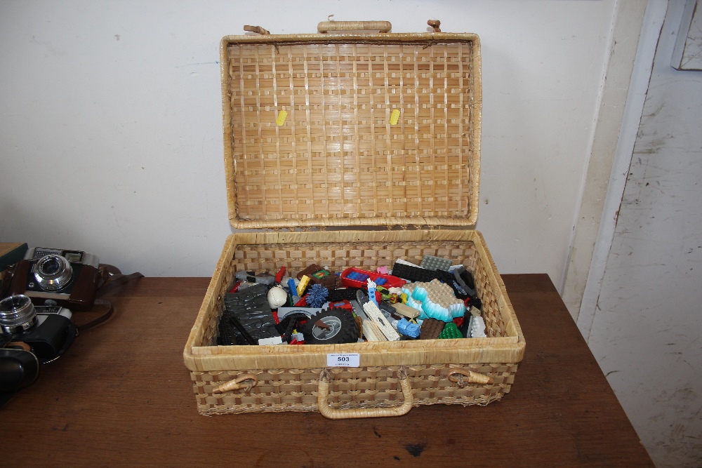 A wicker basket of Lego