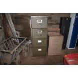 A metal four drawer filing cabinet