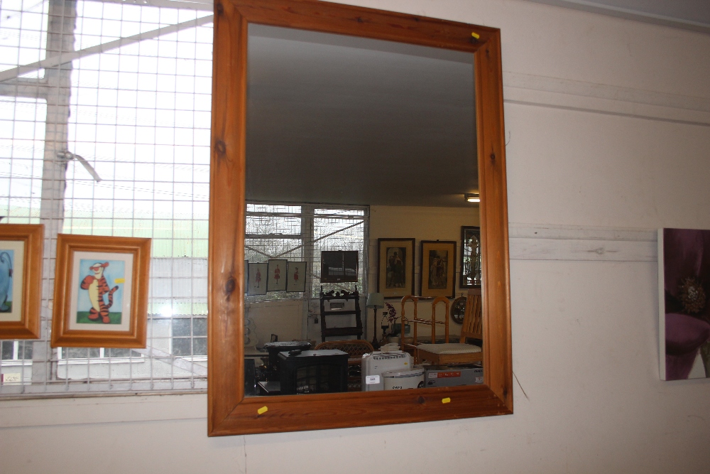 A large pine frame mirror