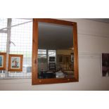 A large pine frame mirror