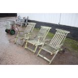 Three teak garden loungers