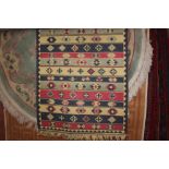 An approx 4'8" x 2'5" Turkish rug