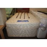 A single divan bed and mattress