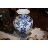 An oriental blue and white vase