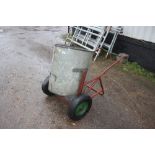 A galvanised garden trolley