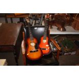 Two small acoustic guitars