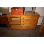 A pine side board fitted four drawers