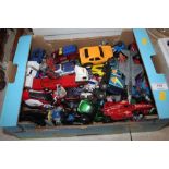 A box of die cast toys etc.
