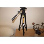 A camera tripod stand