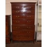 A George III mahogany tall boy, the upper section fitted two short and three long graduated