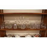 A set of eight 19th Century glass tumblers; various etched glass tumblers; Champagne flutes, saucers