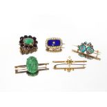 A 9 carat gold bar brooch, mounted with seed pearls and central pale green stone; a seed pearl and