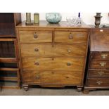 A 19th Century mahogany chest, of two short and three long drawers, raised on bun feet, 102cm wide