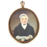 A 19th Century oval miniature portrait, of an elderly lady in black dress and white lace cap,