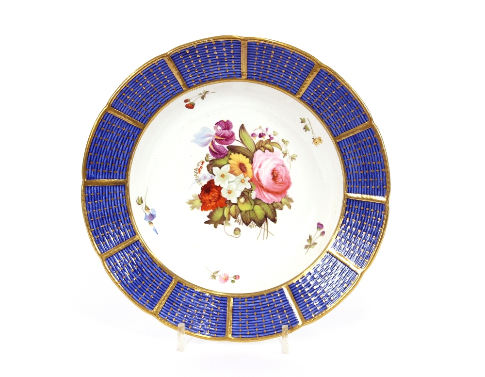 A Minton dessert plate, having floral spray decoration within pierced lattice work border, 24cm