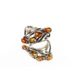 A 925 silver four stone amber ring