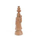 An old terracotta figure of lady carrying child, with water pot balanced on her head, 30cm high