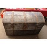 An 18th Century American domed trunk, iron bound, flanked by carrying handles, 116cm wide