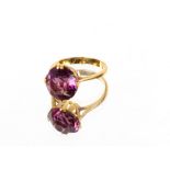 A 9 carat gold and amethyst set ring