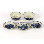 Three 18th Century Worcester blue and white saucers, decorated in the fence pattern and a pair of