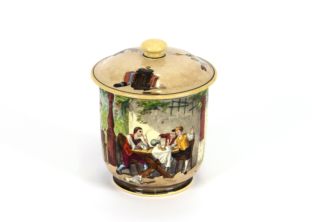 A late 19th Century porcelain pot and cover, decorated with scene of an inn and windmill in the