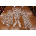 A part suite of thumb pressed patterned glassware, various similar glasses etc.