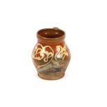 An antique dated slip ware baluster vase, with floral and heart decoration, bearing date 1858,