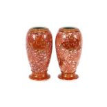 A pair of late 19th/early 20th Century Kutani vases, of ovoid baluster form, profusely decorated