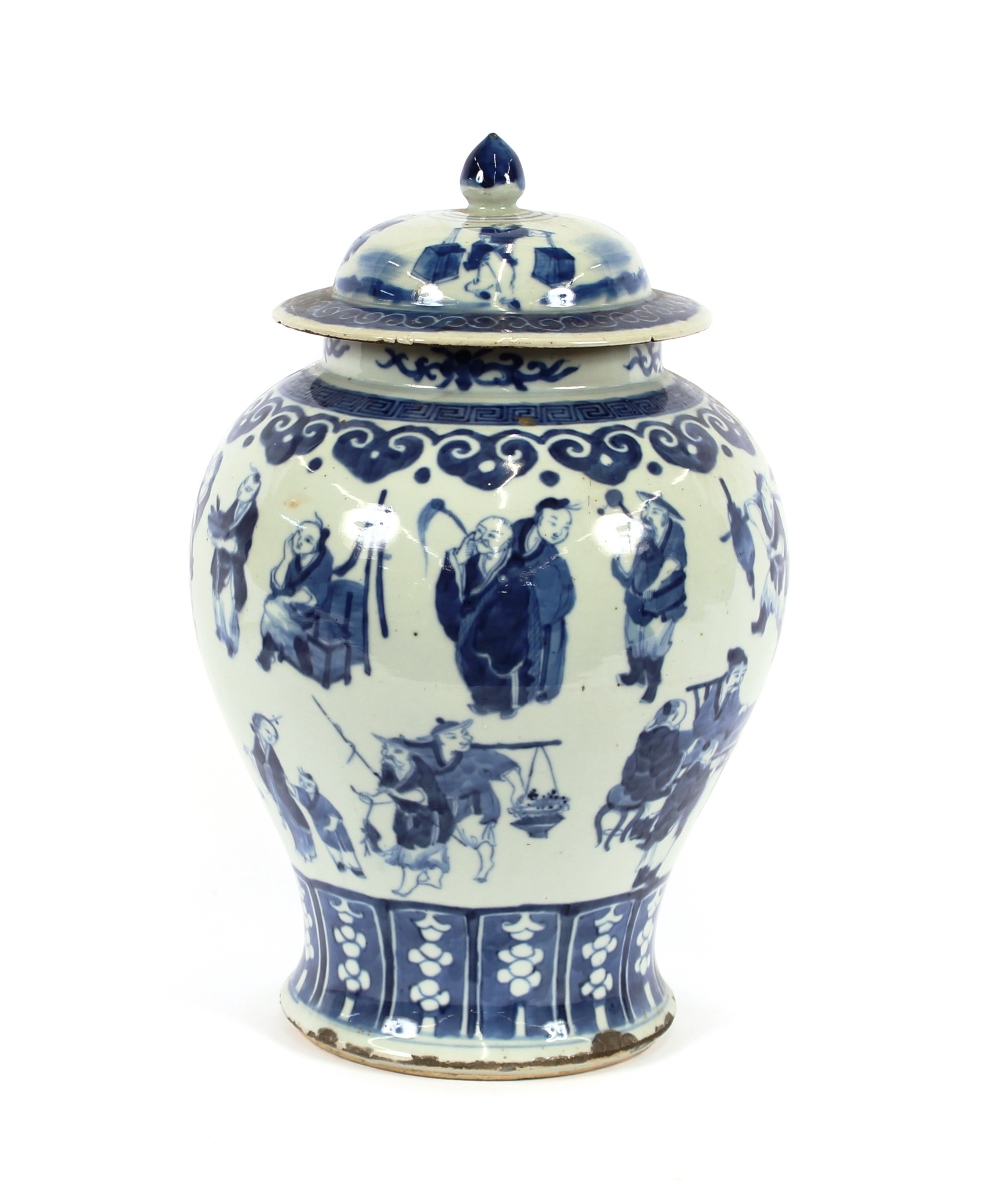 A 19th Century Chinese blue and white baluster vase and cover, decorated with figures and prunus,