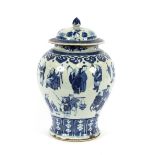 A 19th Century Chinese blue and white baluster vase and cover, decorated with figures and prunus,