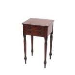 A Victorian mahogany sewing table, fitted two short drawers, raised on turned supports terminating