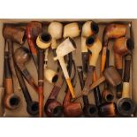 A collection of various pipes, to include: Briar, leather cased, other examples with Meerschaum type