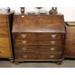 A 19th Century mahogany bureau, the fall front opening to reveal an interior arrangement of