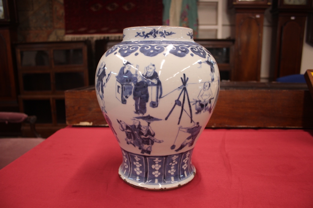 A 19th Century Chinese blue and white baluster vase and cover, decorated with figures and prunus, - Image 9 of 17