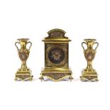 A 19th Century brass clock garniture, decorated in relief with panels of foliage and figures, the