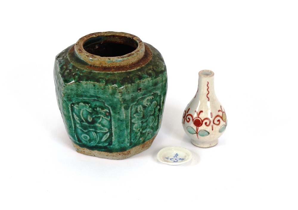 A 19th Century Chinese miniature vase; a miniature plate and an archaic Chinese green glazed jar, (